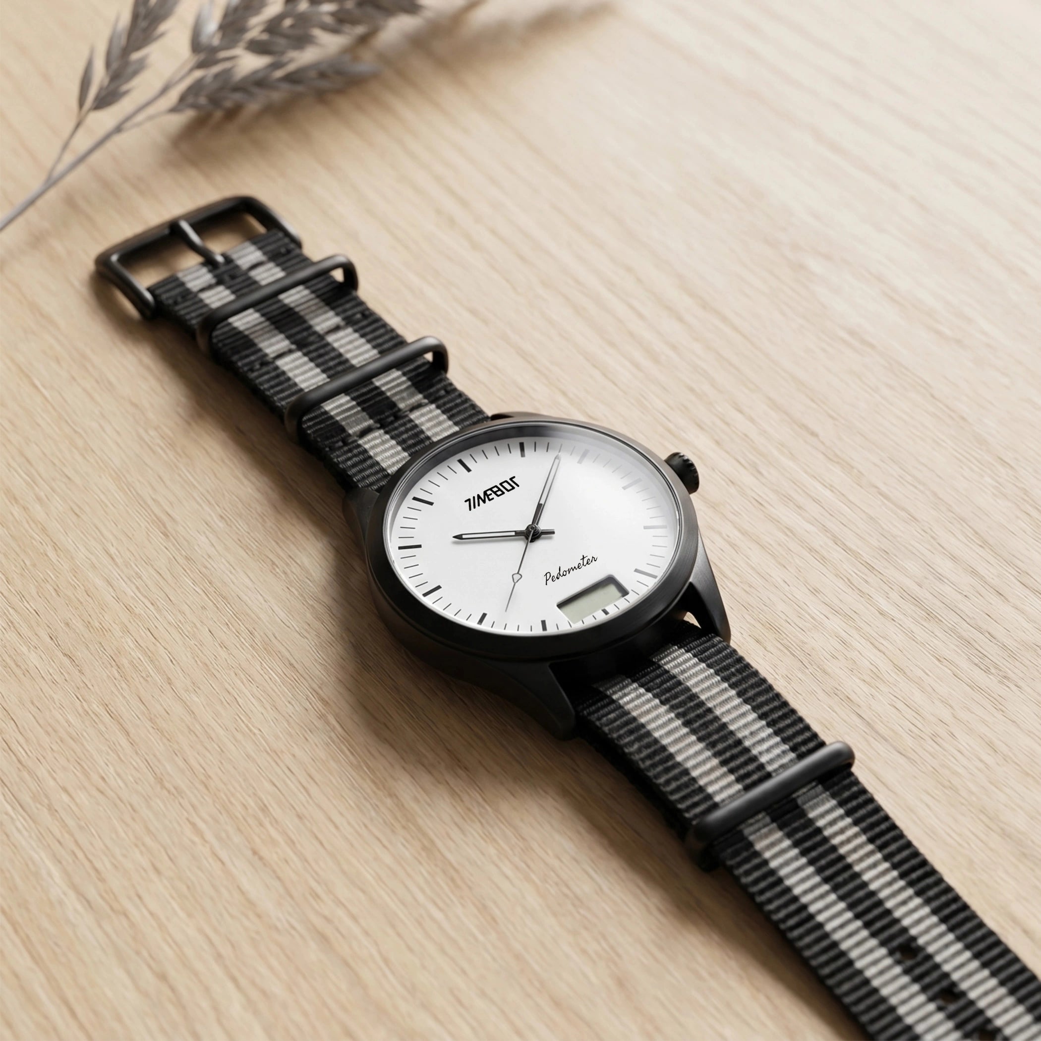 timebot watch t591c3 with white dial nato strap on a desk